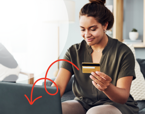 woman making an e-commerce purchase with an arrow overlaid pointing down the page